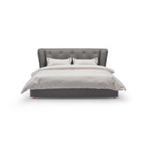 Milos King Size Leather Bed in genuine leather with tufted headboard. A modern luxury statement piece for contemporary bedroom interiors.